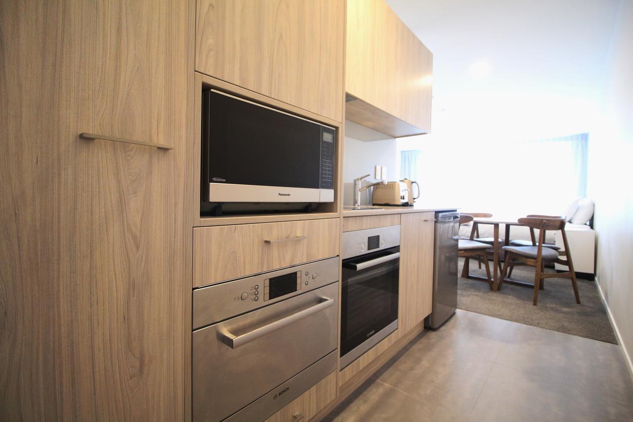 프렌즈 모텔 앤 서비스 아파트먼트 버컨헤드 오클랜드 객실 사진 A kitchen in a student apartment at the University of Melbourne